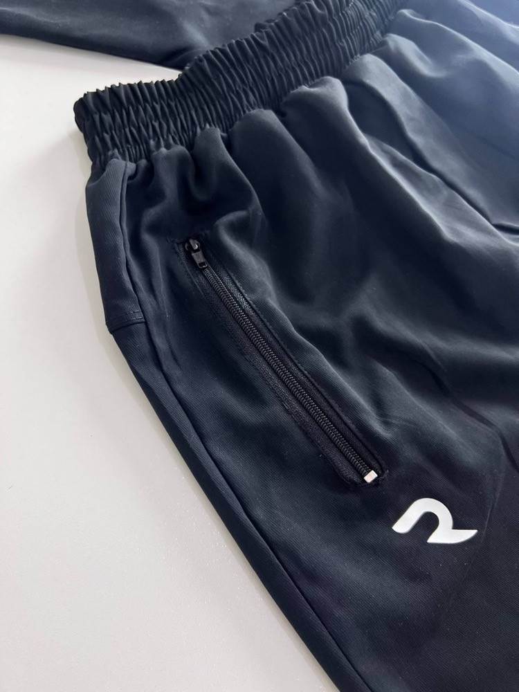 گرمکن شلوار طرح نیم زیپ